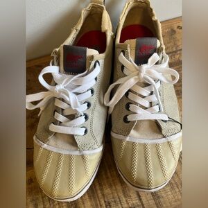 Men’s Sorels Sz 11 lace up tennis shoes.